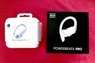 Beats Powerbeats Pro 2 earbuds in Quick Sand color with secure-fit earhooks.