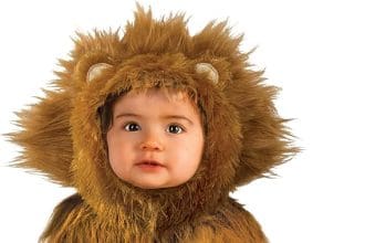 Baby smiling in Rubie’s lion cub baby Halloween costume